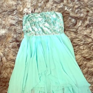 A short mint glittery dress